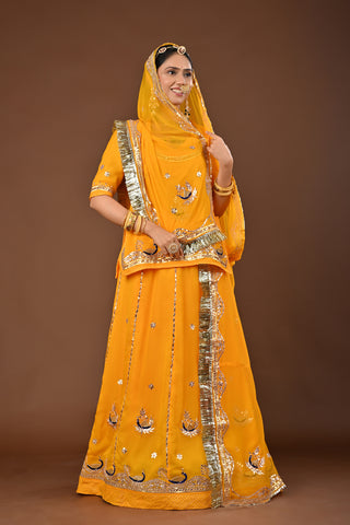 Yellow Traditional Rajputi Poshak in Pure Georgette with Gota Patti with kundan Work