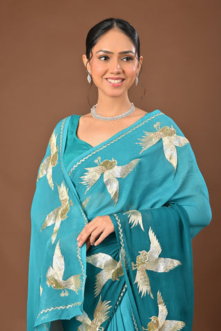 Shaded Teal Green Platinum Chiffon Saree with Aari Kasab Ganga Jamuni Bird Motif border with zardozi and sequins