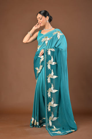 Shaded Teal Green Platinum Chiffon Saree with Aari Kasab Ganga Jamuni Bird Motif border with zardozi and sequins