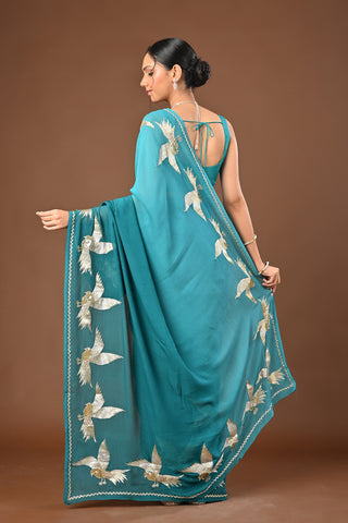 Shaded Teal Green Platinum Chiffon Saree with Aari Kasab Ganga Jamuni Bird Motif border with zardozi and sequins