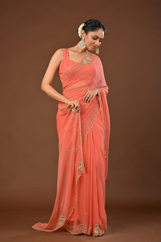 Dusty Peach Chiffon Saree with Cutting Cutdana border with Peacock Motifs