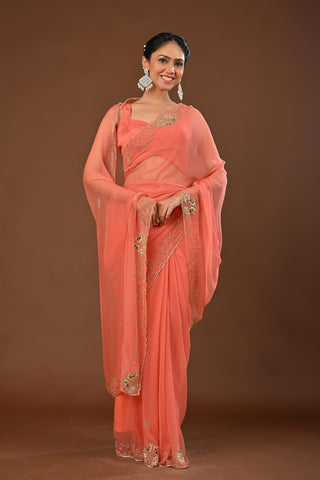 Dusty Peach Chiffon Saree with Cutting Cutdana border with Peacock Motifs