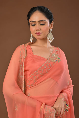 Dusty Peach Chiffon Saree with Cutting Cutdana border with Peacock Motifs