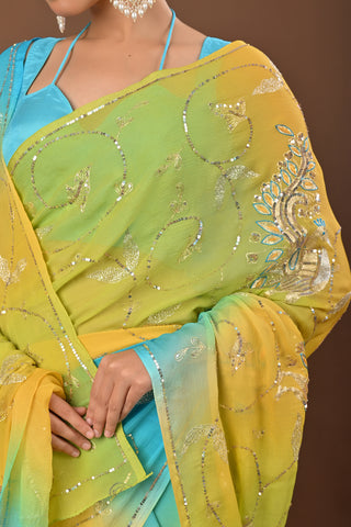 Shaded Yellow Firozi Platinum Chiffon Saree with Aari sequins all over full jaal and peacock kasab sequins big boota all over
