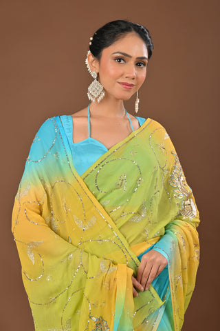 Shaded Yellow Firozi Platinum Chiffon Saree with Aari sequins all over full jaal and peacock kasab sequins big boota all over