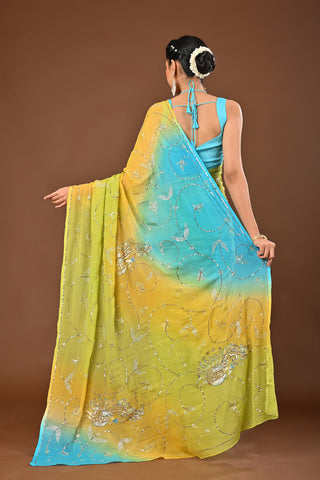 Shaded Yellow Firozi Platinum Chiffon Saree with Aari sequins all over full jaal and peacock kasab sequins big boota all over