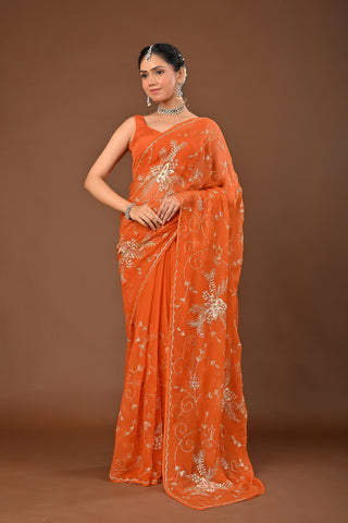 Rust Chiffon Saree with Aari Kasab Jal with heavy boota