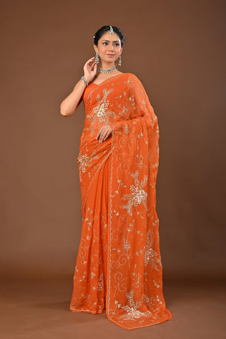 Rust Chiffon Saree with Aari Kasab Jal with heavy boota