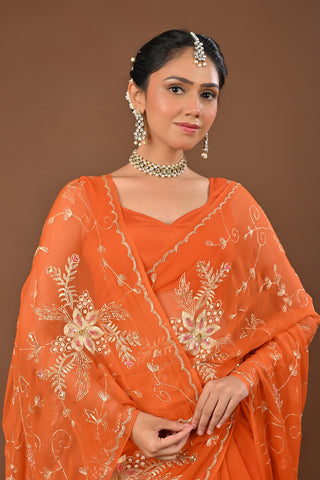 Rust Chiffon Saree with Aari Kasab Jal with heavy boota