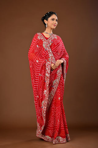 Designer Red Chinnon Saree adorned with Bandhej Saree with Gota Patti with