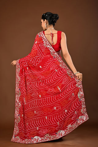 Designer Red Chinnon Saree adorned with Bandhej Saree with Gota Patti with
