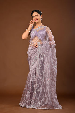 Designer Light Greyish Tissue Saree adorned with Cutdana and Sequins with Full Heacy