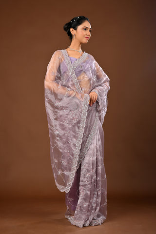 Designer Light Greyish Tissue Saree adorned with Cutdana and Sequins with Full Heacy