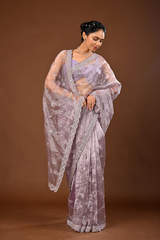 Designer Light Greyish Tissue Saree adorned with Cutdana and Sequins with Full Heacy
