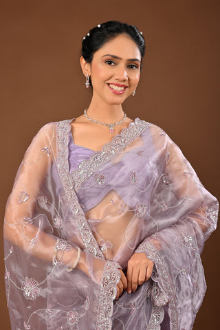 Designer Light Greyish Tissue Saree adorned with Cutdana and Sequins with Full Heacy