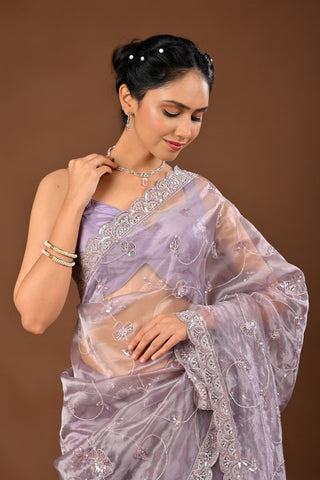 Designer Light Greyish Tissue Saree adorned with Cutdana and Sequins with Full Heacy
