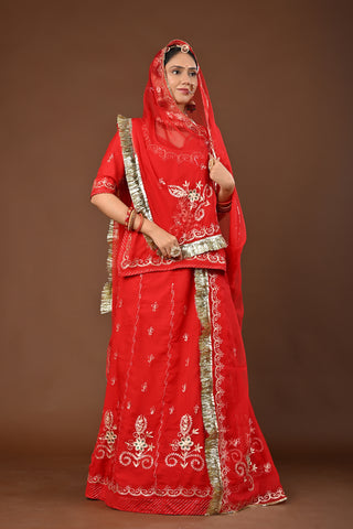 Red Traditional Rajputi Poshak in Faux Georgette with Aari Pittan with kasab Work