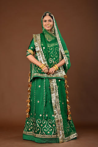 Green Pure Georgette Rajputi Poshak featuring Zero Gota Patti with tiki Embroidery