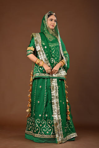 Green Pure Georgette Rajputi Poshak featuring Zero Gota Patti with tiki Embroidery