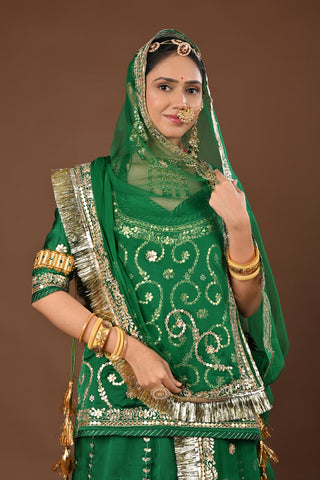 Green Pure Georgette Rajputi Poshak featuring Zero Gota Patti with tiki Embroidery