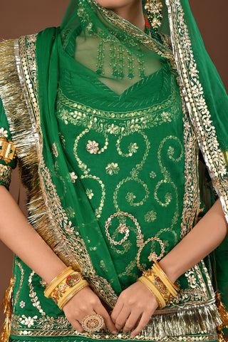 Green Pure Georgette Rajputi Poshak featuring Zero Gota Patti with tiki Embroidery