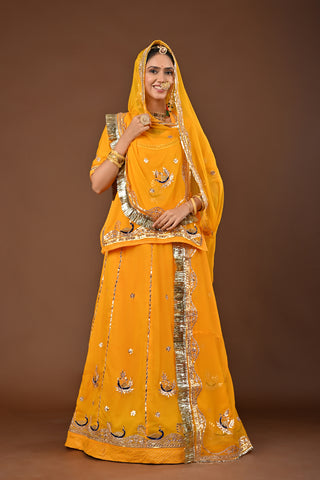 Yellow Traditional Rajputi Poshak in Pure Georgette with Gota Patti with kundan Work
