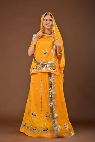 Yellow Traditional Rajputi Poshak in Pure Georgette with Gota Patti with kundan Work