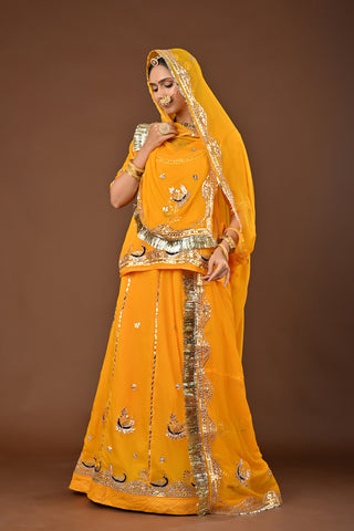 Yellow Traditional Rajputi Poshak in Pure Georgette with Gota Patti with kundan Work