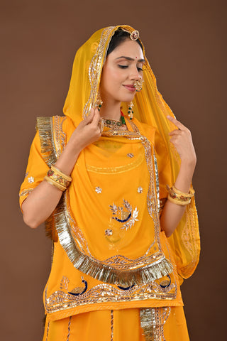 Yellow Traditional Rajputi Poshak in Pure Georgette with Gota Patti with kundan Work