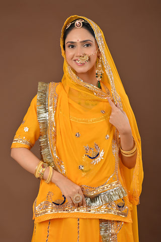 Yellow Traditional Rajputi Poshak in Pure Georgette with Gota Patti with kundan Work