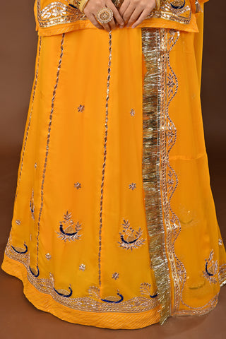 Yellow Traditional Rajputi Poshak in Pure Georgette with Gota Patti with kundan Work