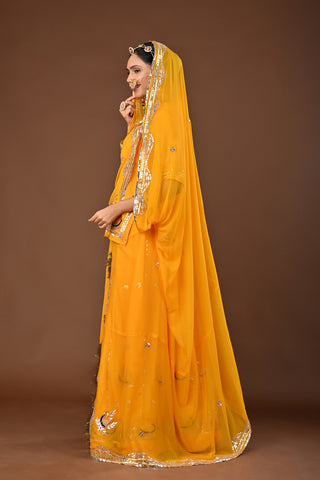 Yellow Traditional Rajputi Poshak in Pure Georgette with Gota Patti with kundan Work
