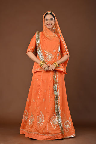 Peach Faux Georgette Rajputi Poshak featuring Aari Pittan with kasab Embroidery