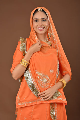 Peach Faux Georgette Rajputi Poshak featuring Aari Pittan with kasab Embroidery