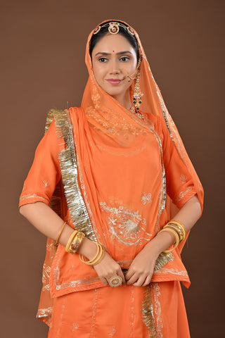 Peach Faux Georgette Rajputi Poshak featuring Aari Pittan with kasab Embroidery