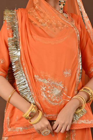 Peach Faux Georgette Rajputi Poshak featuring Aari Pittan with kasab Embroidery