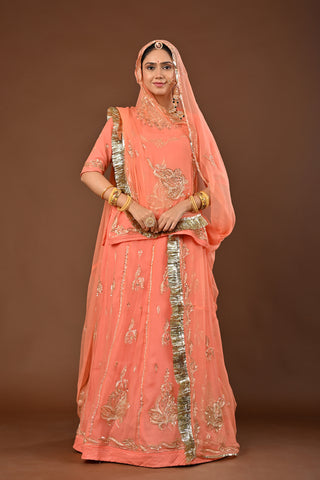Peach Rajputi Poshak with Aari Pittan with kasab in Pure Georgette