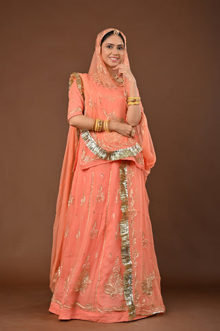 Peach Rajputi Poshak with Aari Pittan with kasab in Pure Georgette