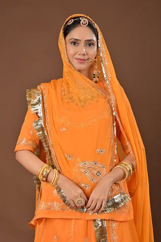 Yellow Faux Georgette Rajputi Poshak featuring Aari Pittan with kasab Embroidery