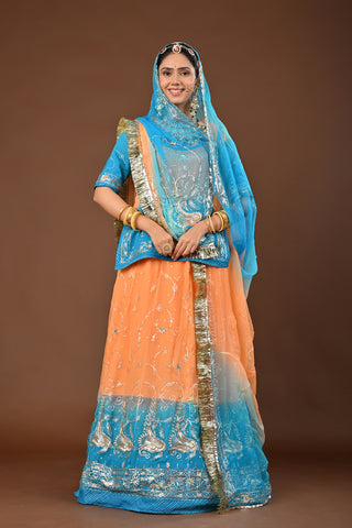 Peach Firozi Shaded Pure Georgette Rajputi Poshak featuring Aari Pittan with kasab Embroidery