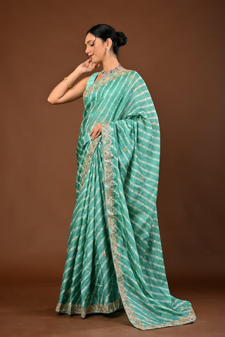 Designer Teal Green Tussar silk Saree adorned with Lehariya Saree with Marodi and Gota