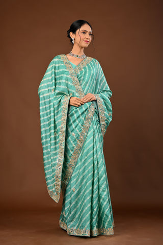 Designer Teal Green Tussar silk Saree adorned with Lehariya Saree with Marodi and Gota
