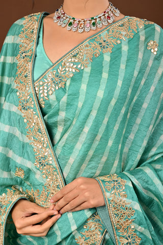 Designer Teal Green Tussar silk Saree adorned with Lehariya Saree with Marodi and Gota