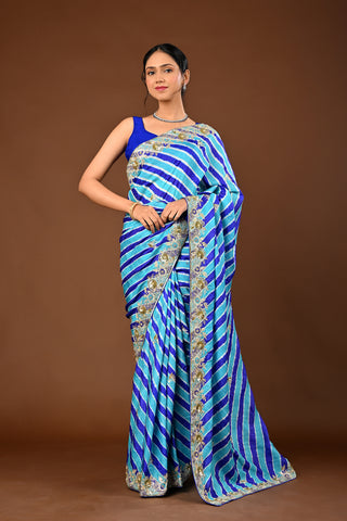 Designer Farozi Blue Tussar silk Saree adorned with Lehariya Saree with Aari Kasab with