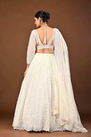 Snow White Net with organza dupatta Lehenga with Cutdana with Sequins