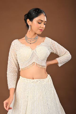 Snow White Net with organza dupatta Lehenga with Cutdana with Sequins