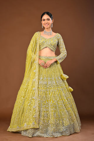 Designer Lemon Green Soft Net Lehenga adorned with Mirror