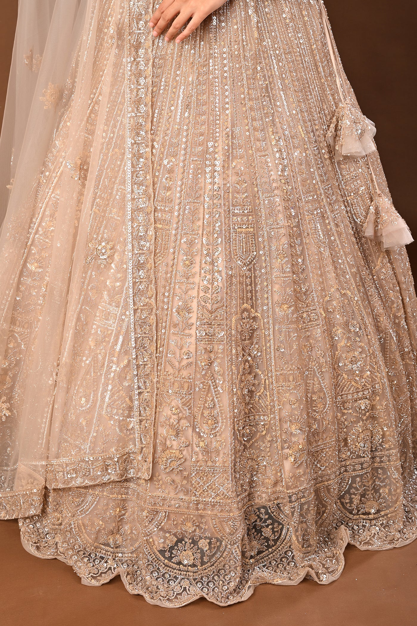 Golden Brown skin tone / beige Lehenga crafted in Soft Net with Hand P Rajvesh India Golden Brown skin tone / beige Lehenga crafted in Soft Net with Hand P Rajvesh India