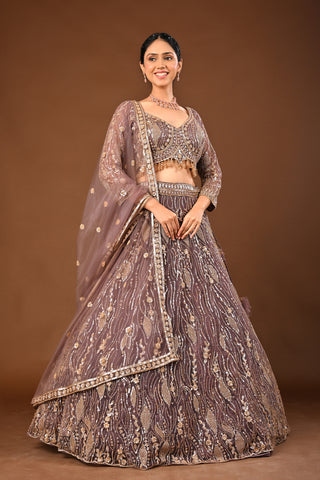 MAUVE Lehenga in Soft Net featuring Cutdana, Tubelight and Sequins