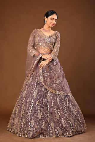 MAUVE Lehenga in Soft Net featuring Cutdana, Tubelight and Sequins